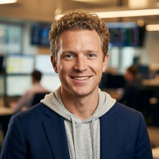 Ryan Brooks, listed as Lead Trading Analyst at Testmodblock1, in a profile image